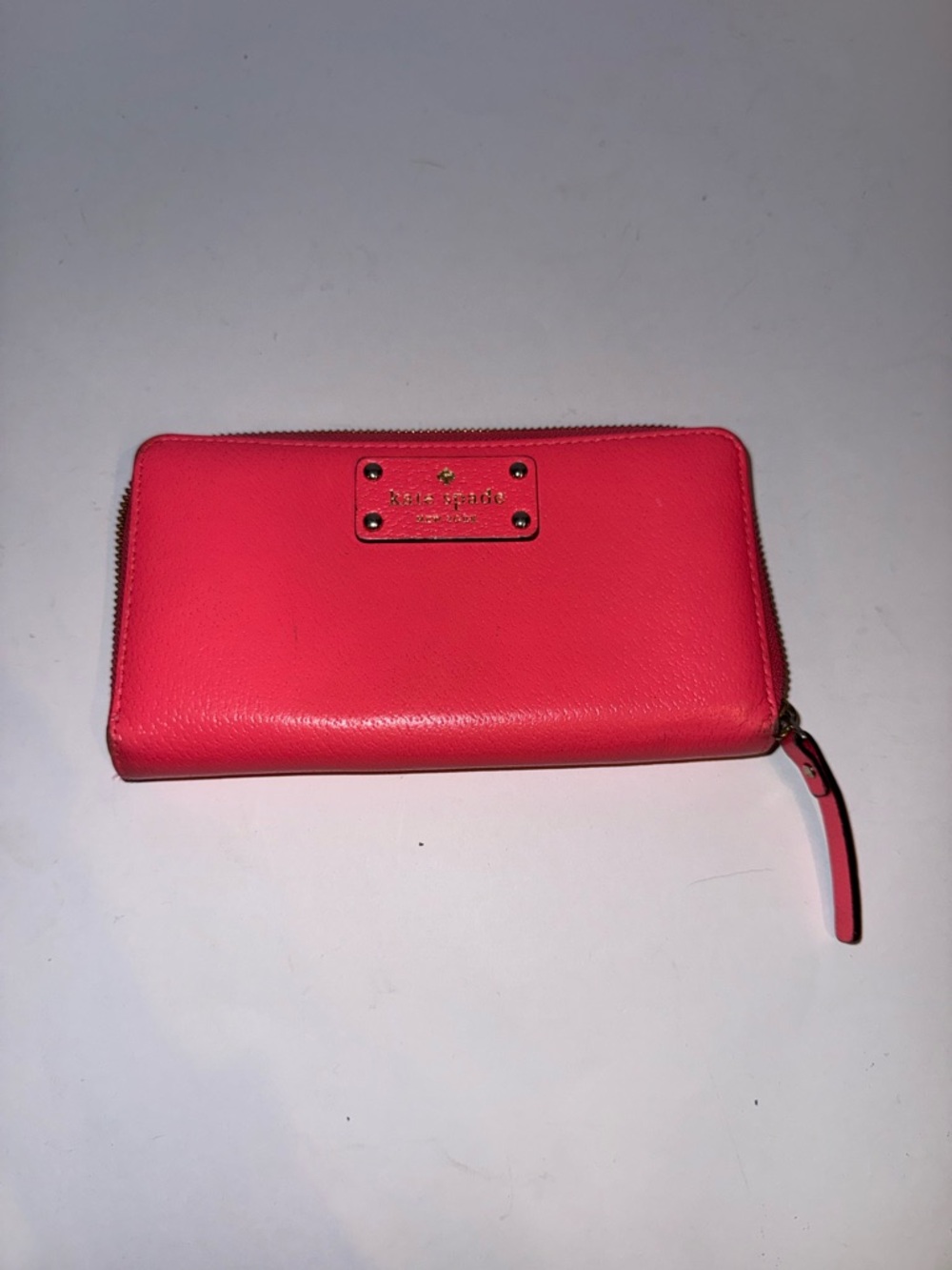 kate spade hot pink zip-around leather wallet